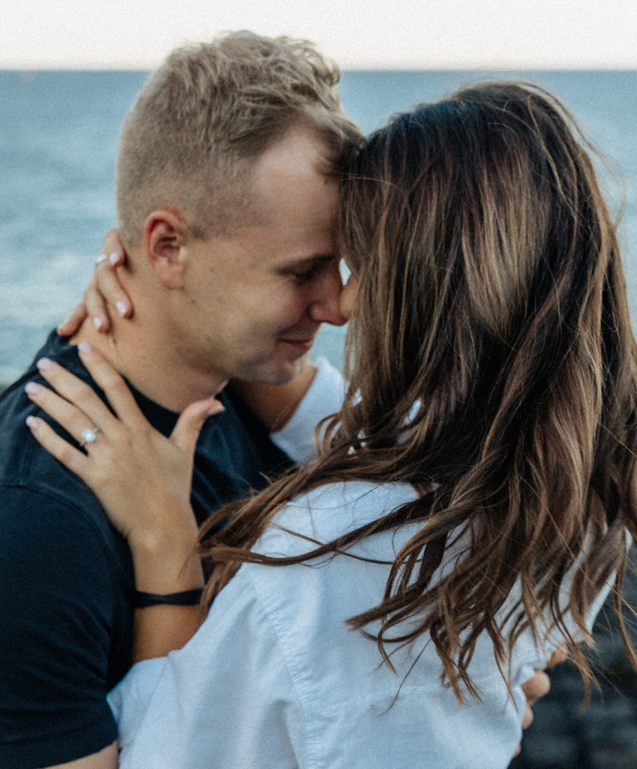 Candid beach engagement session | Marquette, MI